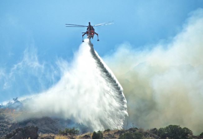 firefighting with helicopter image